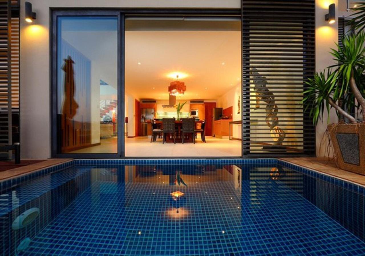 Indochine Resort&Villas - SHA Extra Plus Patong Exterior foto A pool at the hotel