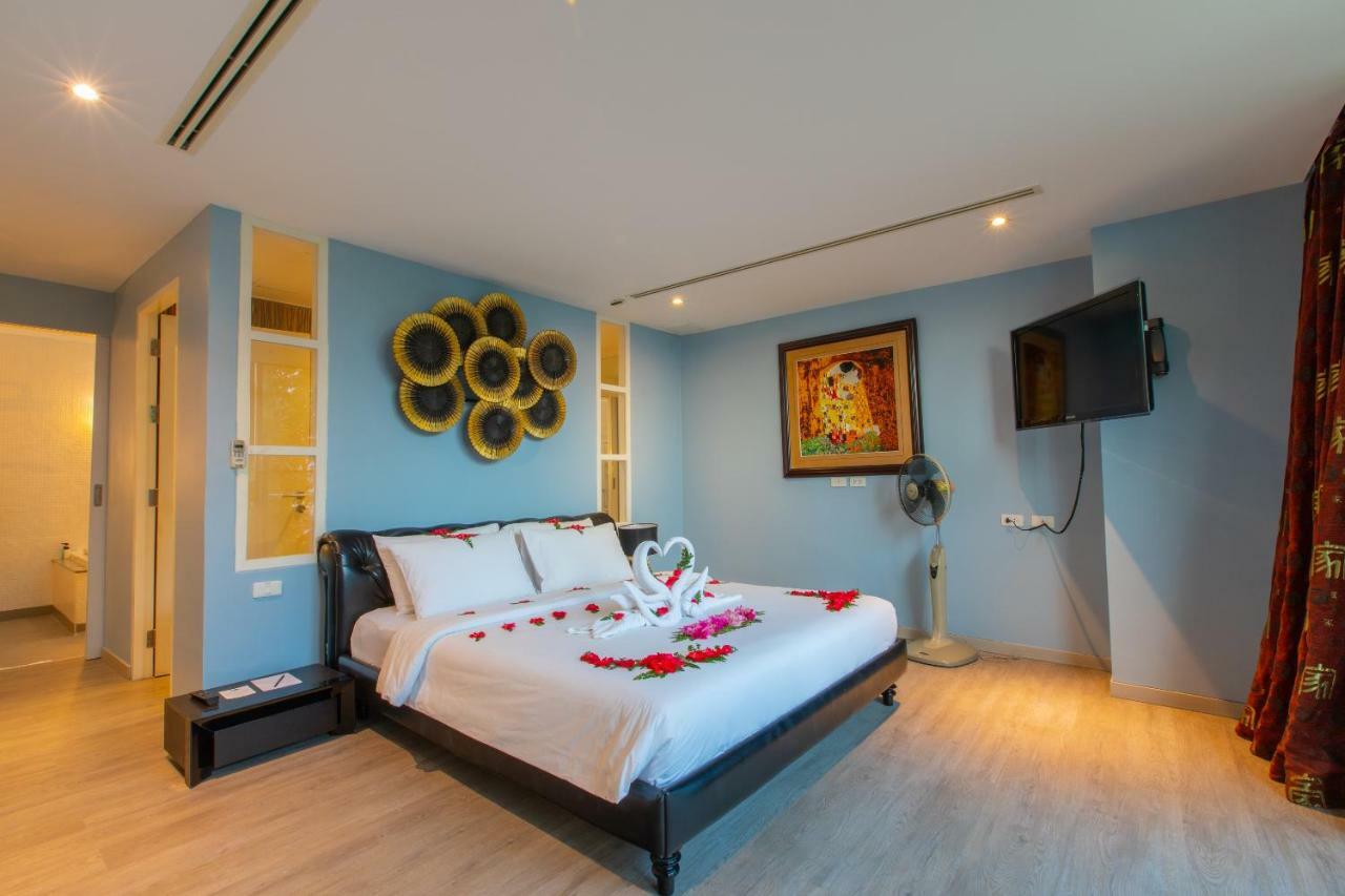 Indochine Resort&Villas - SHA Extra Plus Patong Exterior foto A bedroom at the hotel